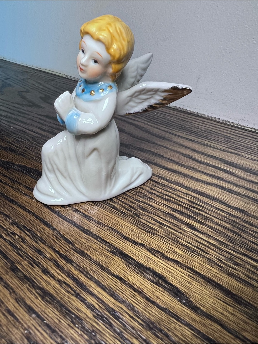 Vintage Porcelain Kneeling Angel Figurine in White and Blue Gold Accents 3.5 in